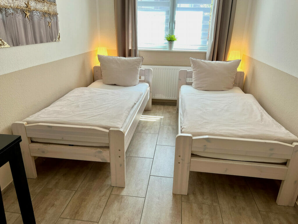 Wohnung Holiday 5 - Schlafzimmer mit zwei getrennten Betten